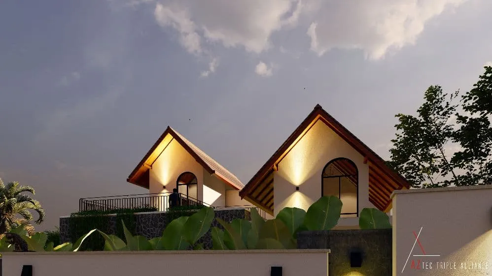 Modern houses with gabled roofs, surrounded by lush greenery under a cloudy sky, create a serene and inviting atmosphere.